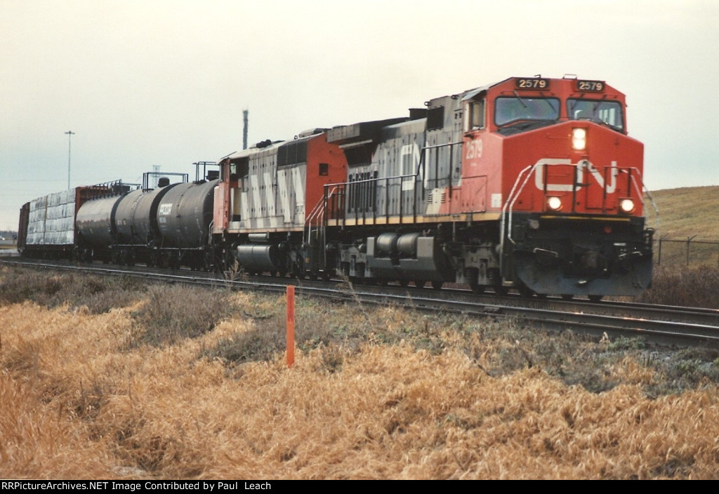 Eastbound manifest rolls through Bretville Junction